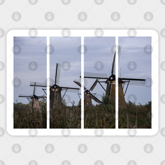 Wonderful landscapes in the Netherlands. Historic dutch windmills in Kinderdijk in a cloudy autumn day. Unesco site. Natural view from distance. Sticker by fabbroni-art